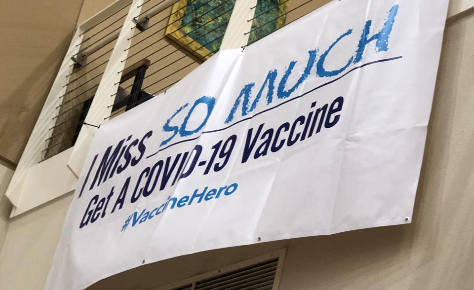 Covid-19 Sign Invites People To Be Vaccine Heroes