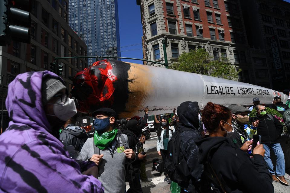Demonstrators march in the annual NYC Cannabis Parade & Rally in support of the legalization of marijuana for recreational and medical use, on May 1, 2021 in New York City. 